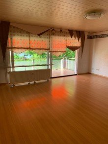 Wohnzimmer Eigentumswohnung mit Hobbyraum in Obertshausen